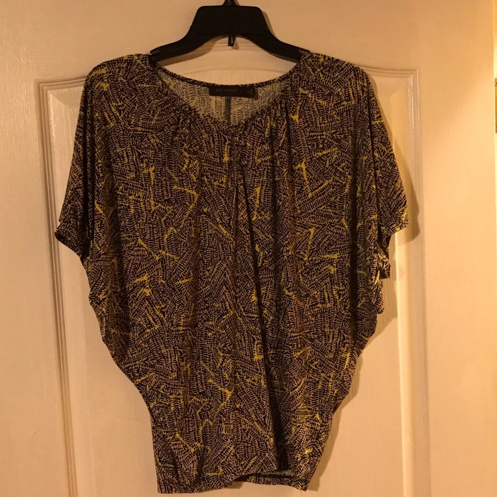 The Limited black, tan, and bright yellow in XS.